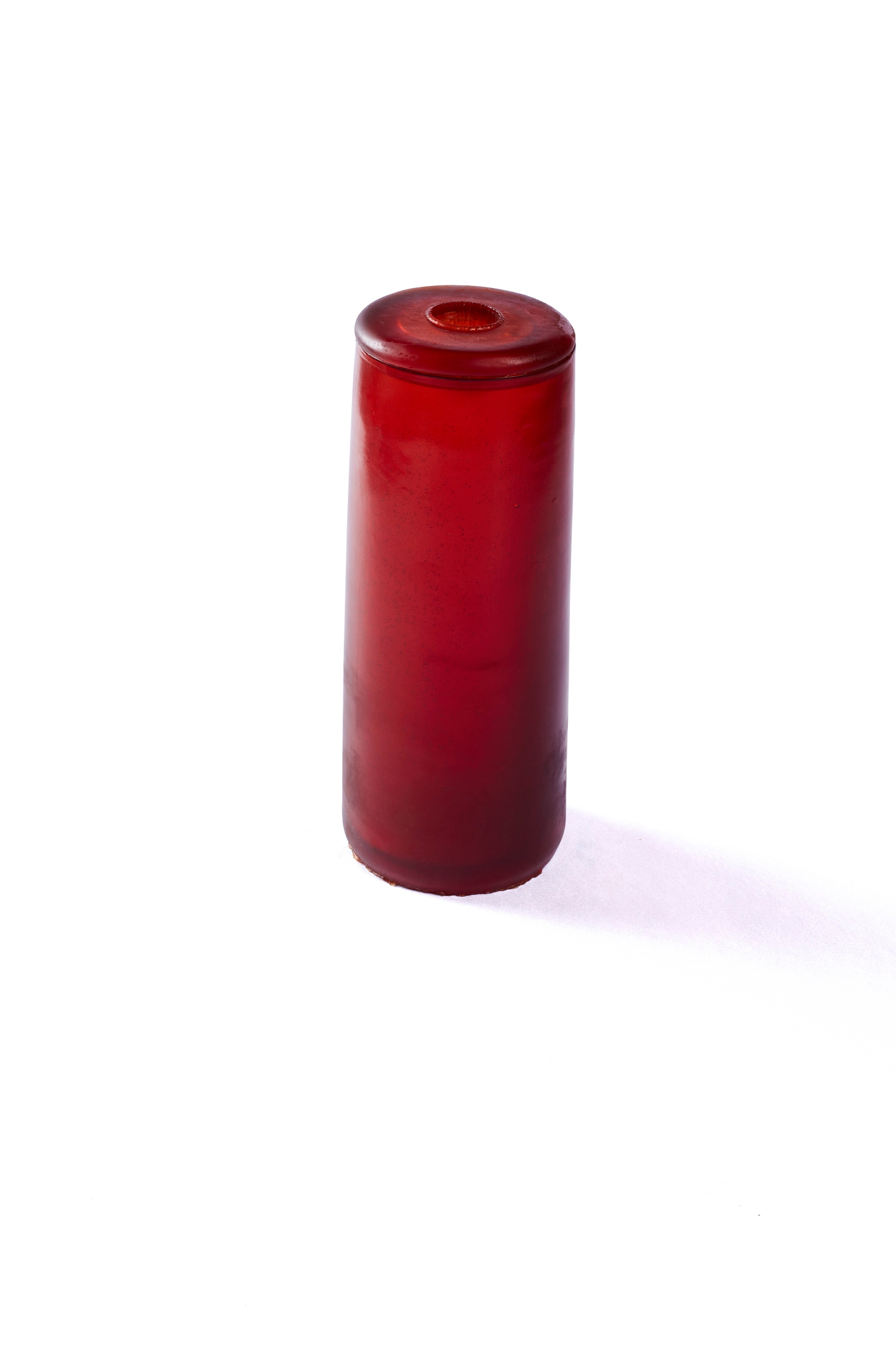 A tall rubber gleba urn in a bright red.