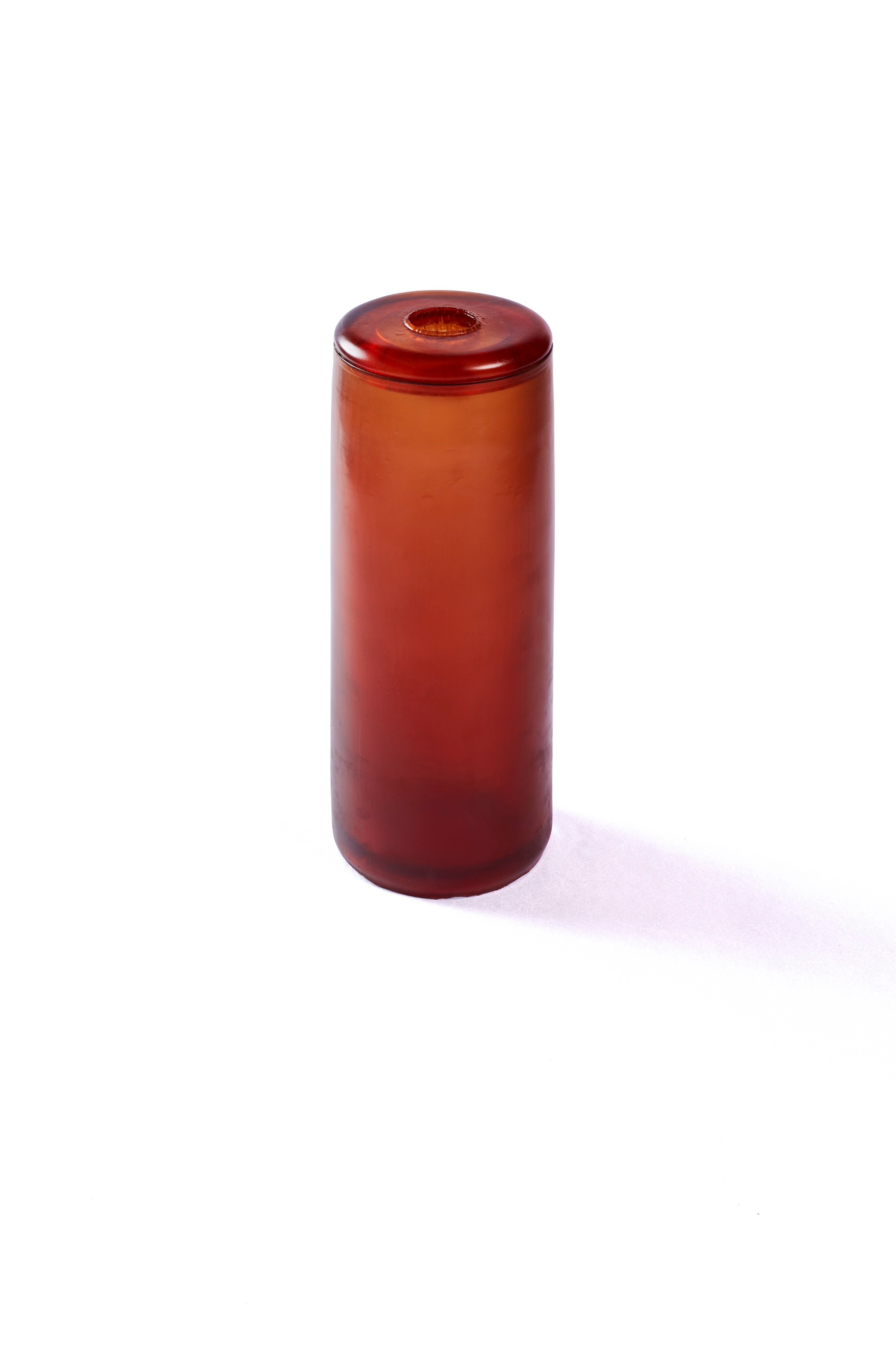 A tall rubber gleba urn in a rich orange.