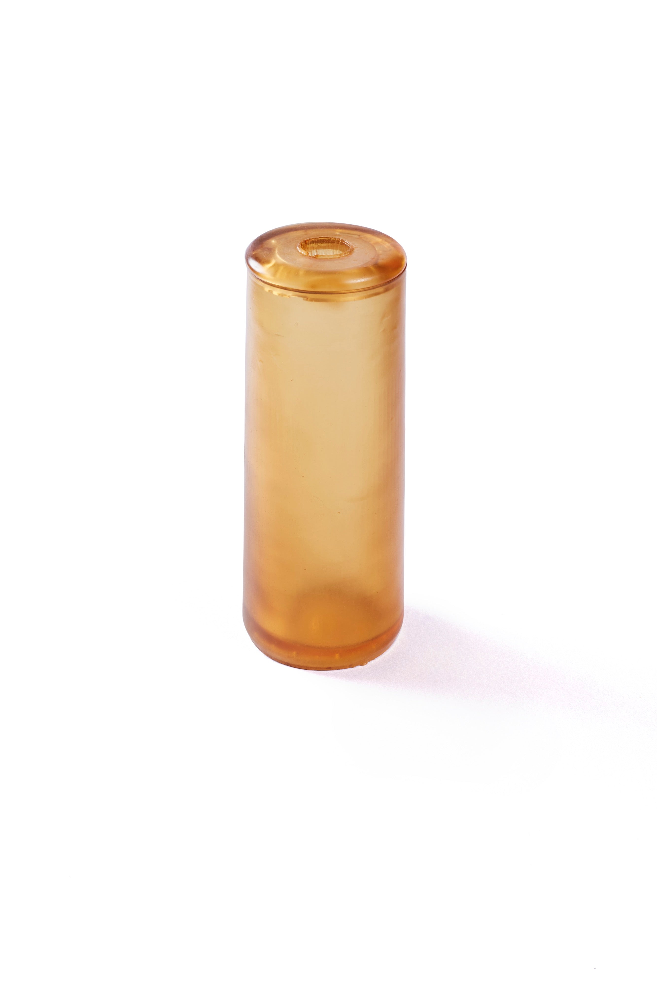 A tall rubber gleba urn in clear amber.